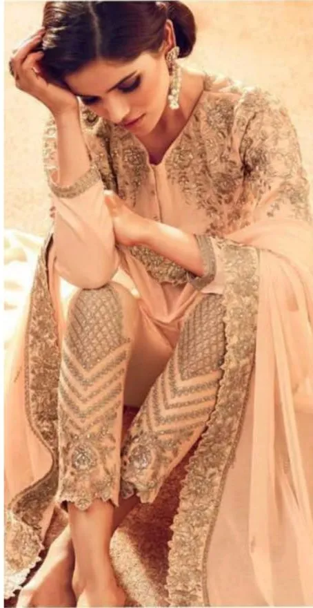 Beige colored heavy embroidery kurta set  - Rent