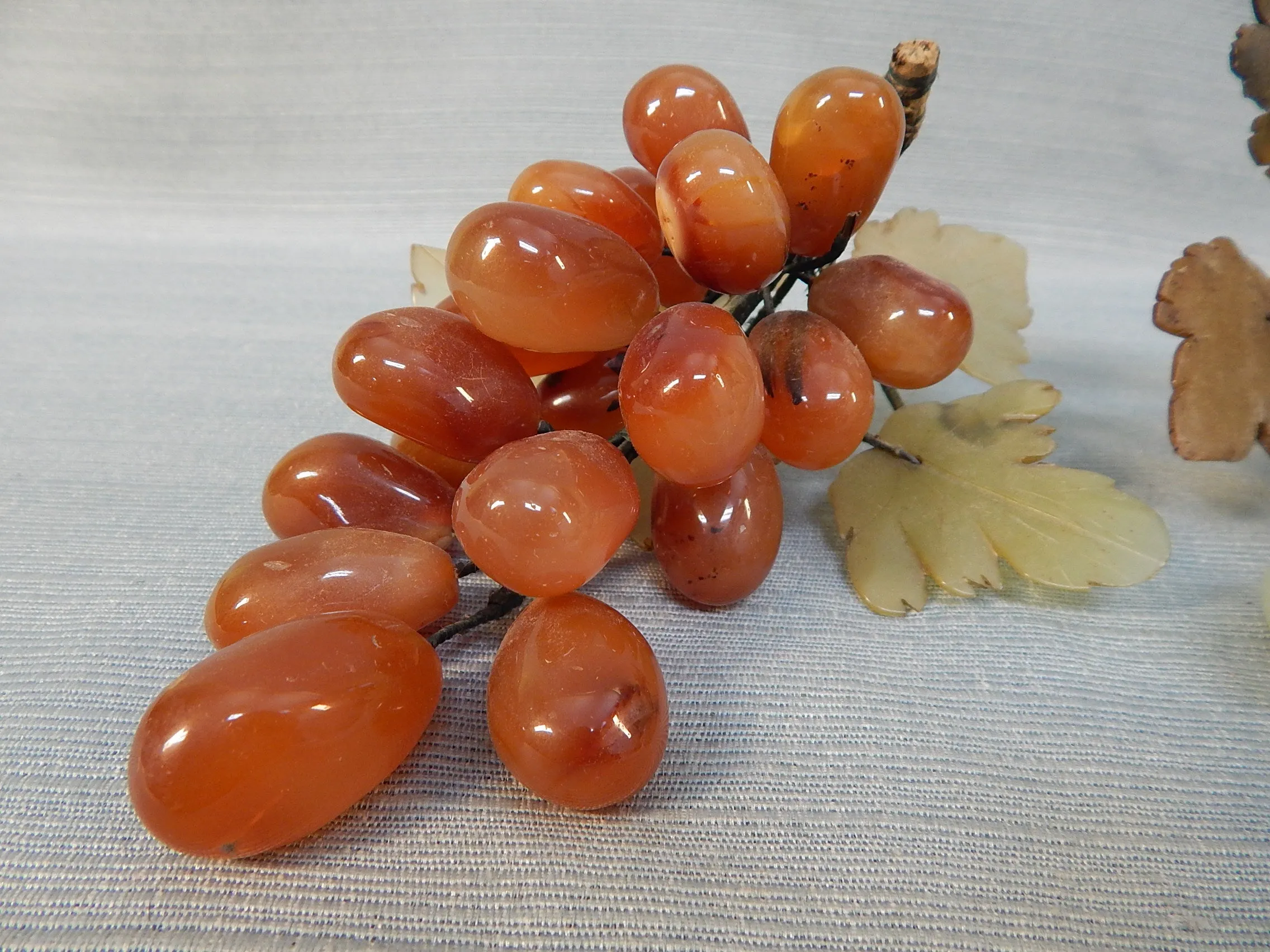 Two Clusters of Stone Grapes